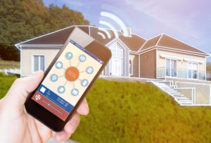 A remote app on a cell phone sending signal to a house to control the temperature 