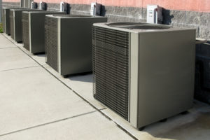 a row of five outdoor commercial HVAC units 
